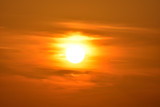 Fototapeta Zachód słońca - The sun between clouds, Sunset with clouds.