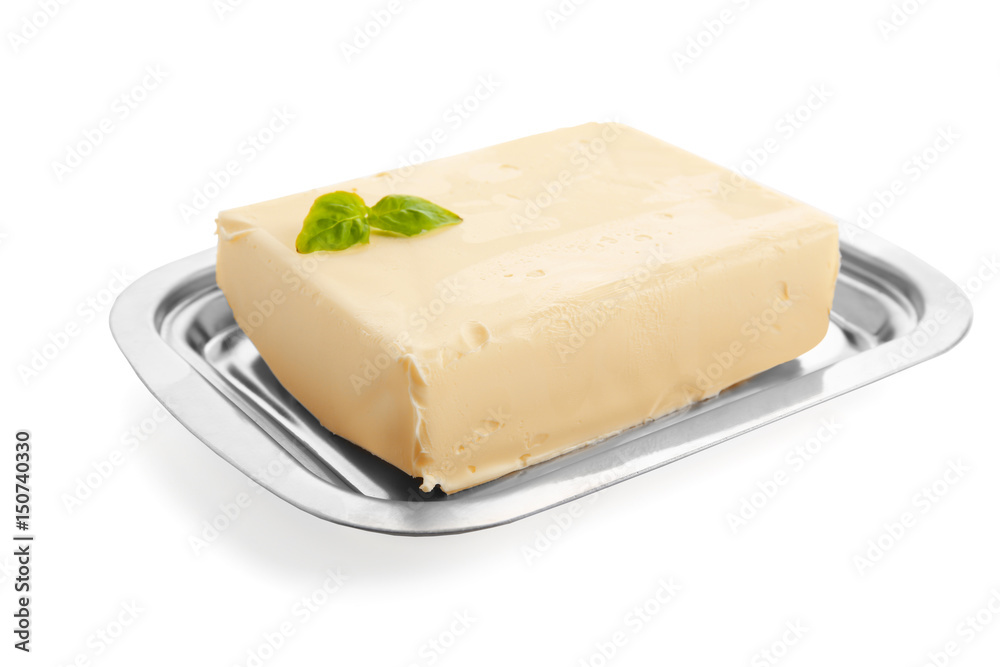 Dish with butter on white background