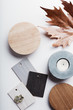 Flat lay of autumn grey and warm tone interior finishes objects