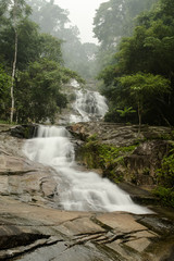  Waterfall and stone in the rain-forest.