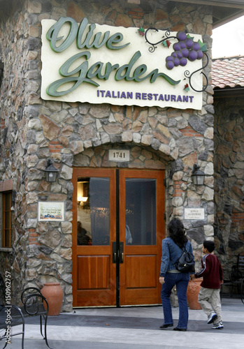 Customers Are Shown Outside An Olive Garden Restaurant In Burbank