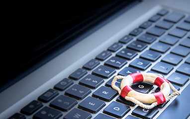 life preserver icon on computer keyboard.