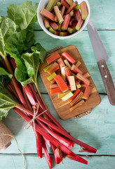 Poster - pieces of rhubarb on turquoise wooden surface