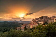 Village Of Belgodere In Corsica Lit By Dramatic Sunset
