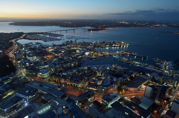 Wall Mural - Aerial landscape view of Auckland city with Waitemata Harbour bridge at dusk