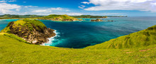 Panoramic View Of The Azure Bay With .rocky Coast And Green Pasture Slope, Indonesia
