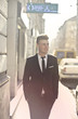 © olly - Young businessman walking in the street