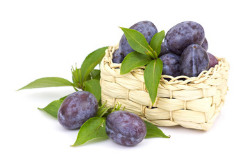 Wall Mural - fresh plums in a basket