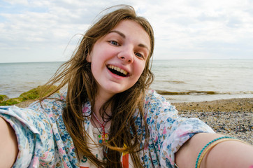 Teen girl sea selfie, happy teen on holidays