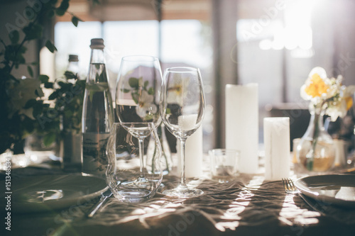 Dishware With Floral Decoration On Table At Sunset Wedding Festive Interior Table Decorations Flowers Table Setting Wine Glass Pastel Summer Tones Buy This Stock Photo And Explore Similar Images At Adobe