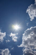 輝く太陽と青空（紫外線、未来、可能性などのイメージ）、左上などにタイトルスペース