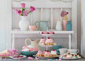 pink cakes on plate on white background