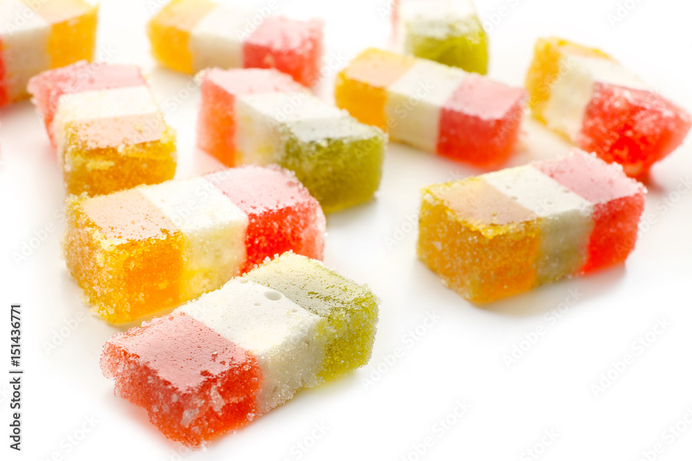 Tasty marmalade candies on white background