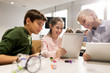 © Syda Productions - kids with tablet pc programming at robotics school