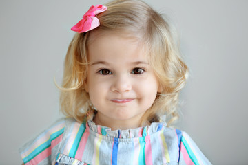 Poster - Cute little girl eating yogurt at home