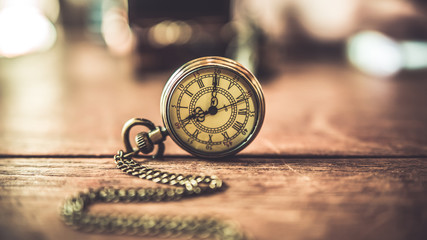 Wall Mural - Vintage Pocket Watch On Wood Table