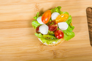 English muffin with heirloom tomatoes