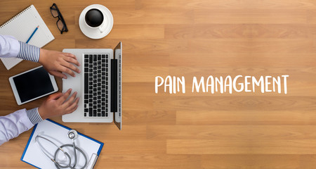 Wall Mural - Pain Management Medical Concept doctor hand working