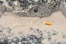 Cigarette Butt Littering Beach Sand