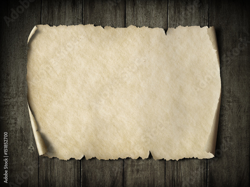 Fototapeta na szkło vintage parchment or map on dark wood 3d illustration