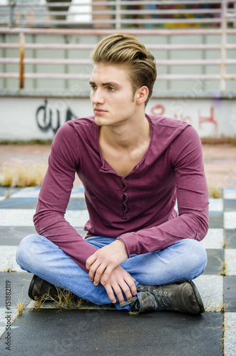 Handsome Blond Young Man Outdoors Looking Away To A Side Buy