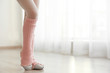 © Africa Studio - Legs of little girl dancing at studio