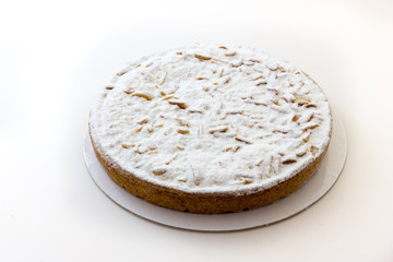 Cream cake with pine nuts