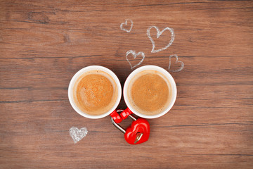 Poster - Cups of coffee with hearts on wooden table