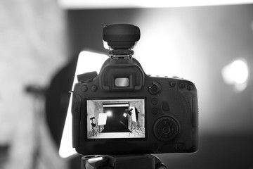 Canvas Print - Empty photo studio interior on camera display