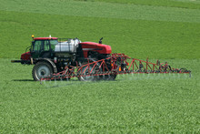 Tractor With Agricultural Sprayer Machine For Pesticide Spraying