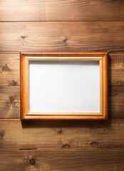 photo picture frame at wooden background