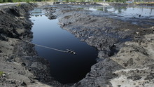 Former Dump Toxic Waste, Oil Lagoon Contamination. Nature Effects From Water And Soil Contaminated With Oil And Chemicals, Environmental Disaster, Contamination Of The Environment, Moravia, Europe