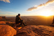 © Maygutyak - Hiker meets sunset at Grand view  point in Canyonlands National park in Utah, USA