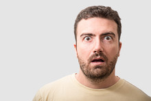 Head Of Surprised Man Portrait On Gray Background
