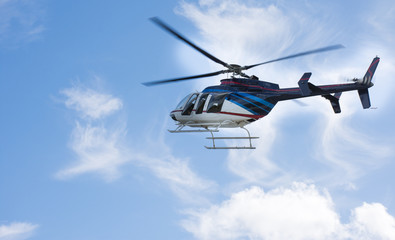 Helicopter flying the blue sky