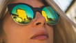 © Artem Markin - Close-up face portrait of young beautiful woman with perfect skin in round sunglasses