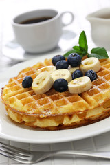 Wall Mural - homemade american round waffles with blueberry and banana