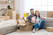 © Friends Stock - Young couple moving to a new apartment together relocation