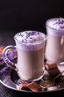 Cappuccino with lavender and chocolate syrup and flowers