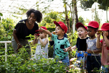 Wall Mural - Teacher and kids school learning ecology gardening