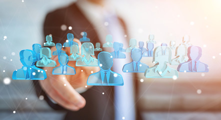 Aufkleber - Businessman holding 3D rendering group of blue people