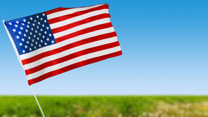 American flag against blue sky