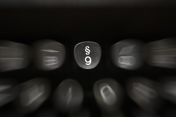 Fototapete - Digit on black key on retro typewriter 9