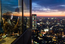 Woman Visit The Terrace And Taking Photo Of The Sunset In Tokyo City