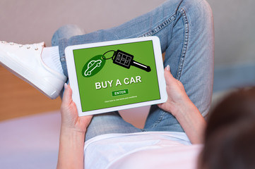 Car sale concept on a tablet