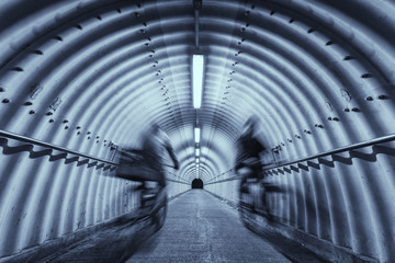 Poster - biker riding on bicycle in tunnel