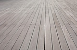 Fototapeta Desenie - A background of brown wood flooring