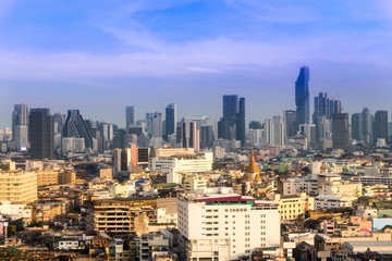 cityscape Bangkok skyline, Thailand. Bangkok is metropolis and favorite of tourists live at between modern building / skyscraper, office building and Community residents with blue sky and cloud