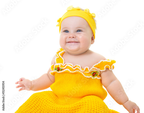 cute baby girl in yellow dress