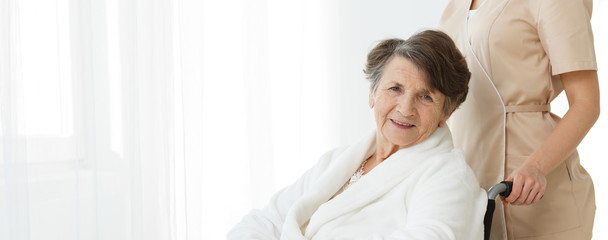 Canvas Print - Senior woman on wheelchair